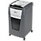 Rexel paper shredder, gray and white, with wheels. The container is full. There is lettering on the device.