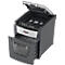 Gray paper shredder with open flap and pulled-out collection drawer. Inside are shredded paper strips.