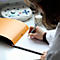 Rhodia Block No.18, 80 Blatt, DIN A4, 80 g/m², Kartoneinband, geheftet, Velinpapier, PEFC®-zertifiziert, liniert, mit Rand, orange