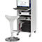 White bar stool next to a rolling cart with a laptop, office supplies, and a speaker.