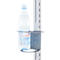 Water bottle in holder on a post. Inscription: Mineral water CLASSIC. Holder silver.
