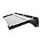 Black paper cutter with gray cutting surface. The paper cutter has an ergonomic design with a curved edge.