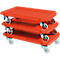 Three orange plastic shelves with casters, stacked.