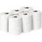 Seis rollos de papel higiénico, blancos con patrones de círculos grises, dispuestos.