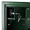 Close-up of a green safe door with key in the lock. The door is open, a part of the interior is visible.