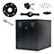 Black cube with accessories: keys, screws, lever. All against a white background.