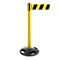 Yellow and black striped retractable belt barrier post. Black base. Belt with yellow and black stripes.