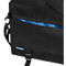 Sac noir avec fermeture éclair et doublure bleue. La bandoulière et un petit patch avec "LIGHTTRAK" sont visibles.