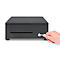 Black cash register with key. A hand holds the key to open the cash register. On a white background.