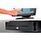 A hand touches a touchscreen, below which is a cash drawer. Buttons and menus are visible on the screen.