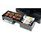 Open cash register with coins and banknotes. Black cash drawer with coin compartments, banknotes and pen.