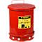Red oil drum waste can with yellow label. Marked "JUSTRITE" and "EMPTY EVERY NIGHT".