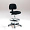 Black office chair, height adjustable, with footrest. On a light background.