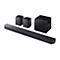 Schwarzes Surround-Sound-System, bestehend aus Soundbar, zwei Lautsprechern und Subwoofer. Vor weißem Hintergrund.
