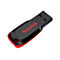 Clé USB SanDisk, noire avec un accent rouge. Le texte "SanDisk" est en rouge.