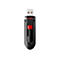 Une clé USB noire avec curseur rouge, marque Sandisk, avec connecteur USB en métal.