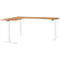 L-shaped height-adjustable desk with wooden top and white frame.