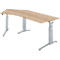 A height-adjustable desk with a light wood top and silver legs. The tabletop has a curved shape.