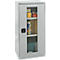 Grey steel cabinet with glass door, filled with folders, boxes, and accessories. The cabinet has a black handle.