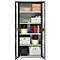 Open steel cabinet with various stored items: boxes, tool cases, rolls.