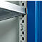 Detailed view of a metal shelf construction with silver shining shelves and a blue side wall.