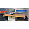 Workbench with accessories, tools, drawers, drill and wooden board.