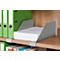 A gray paper tray on a wooden shelf filled with white paper. Next to it green files.