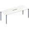 A white conference table with a gray frame. A rectangular, silver recess is set into the tabletop.