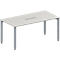 Rectangular table with a light gray table top and silver legs, a long metal opening in the center.