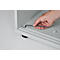 Close-up of a hand using an Allen wrench in a piece of furniture.