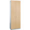 A light brown cabinet with two doors, silver sides, and two oblong handles.