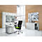 A modern office with a desk, chair and cabinets. A person stands at the window.
