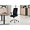 Black office chair with armrests and wheels in front of a desk and wall unit.