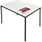 White table with black legs and a red notebook.