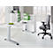 White desk with grey office chair. Green files and decorations. Bright room with window.