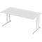 White desk with chrome legs. The tabletop has a rectangular shape and looks smooth.