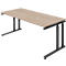 A light wood desk with a black metal frame. The table legs are height adjustable. Perspective view.
