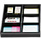 Black drawer with compartments. Contains Post-it notes, notes, notepads, and a bag of small stones.
