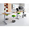 A bright desk with height-adjustable feet and green stools in a modern office. Plans and a screen are on the table.