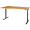 An adjustable height desk with a light brown tabletop and black metal legs. The desk has an angled shape.
