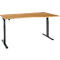 An adjustable height wooden desk with dark legs. The table has a slightly curved shape.