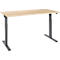 An adjustable height desk with a light wood top and gray metal legs, standing on a white surface.
