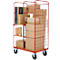 Transportwagen met dozen en monitor. Rood frame en rooster, op wielen.