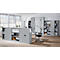 An office with grey cabinets, desk, chair and files.