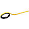 Yellow flexible tape with black underside, formed into a loop.