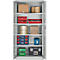 Open cabinet with various stored materials, including cardboard boxes, toolboxes, and plastic containers.