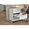 Person opening a drawer of a white mobile pedestal under a desk. Papers are inside.