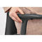 Close-up of a hand operating a button on the arm of a black office chair, against a background of brown clothing.
