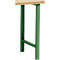 Gros plan détaillé d'un pied de table vert. La table rectangulaire a un dessus en bois clair.