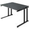 A grey, height-adjustable desk, photographed slightly from above. The legs are black.